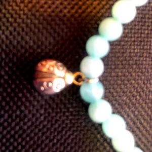 Beaded bracelet with good luck ladybug charm